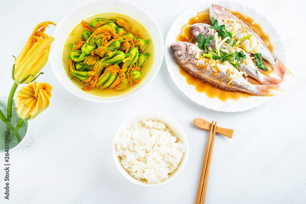 Chinese dish steamed red shirt fish and fried pumpkin flower