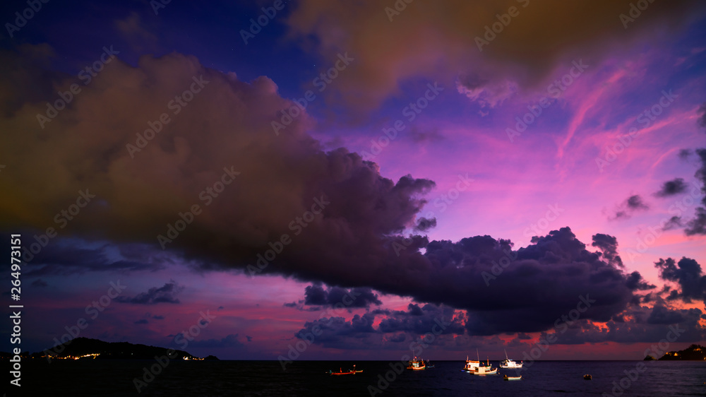 Dramatic clouds Amazing colorful majestic sky over sea in evening time,Dark Blue​ Hour Silhouette mo