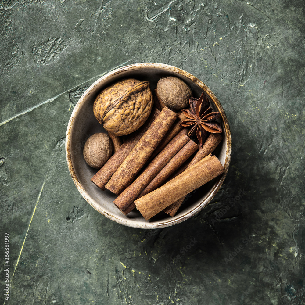 Set of spices on rustic background, flat lay