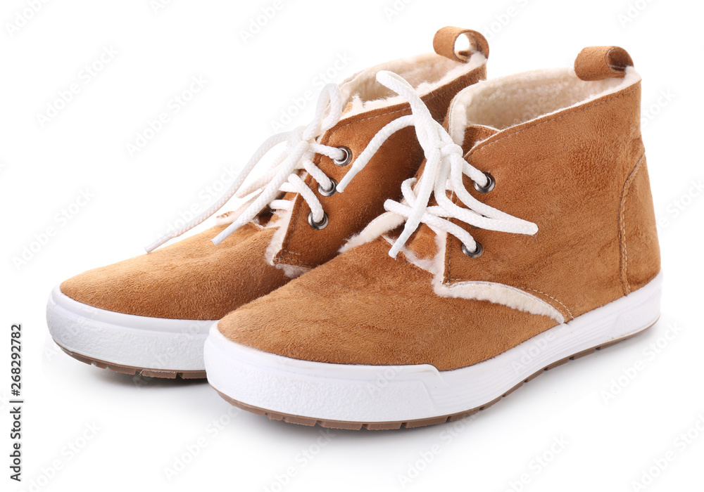 Pair of stylish casual shoes on white background