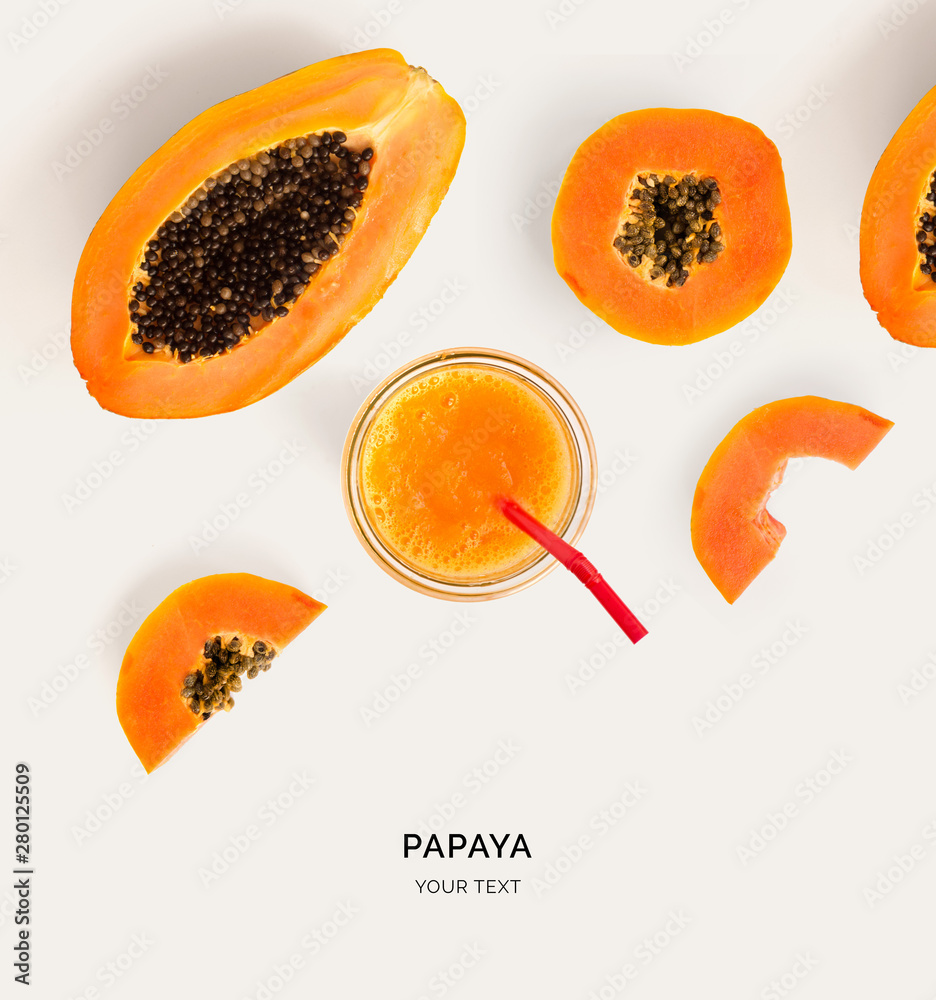 Creative layout made of papaya smoothie. Flat lay. Food concept. Papaya on the light background.