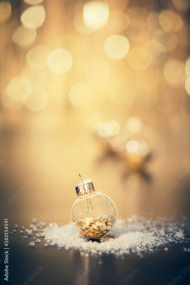 Christmas decoration on abstract gold background, close up