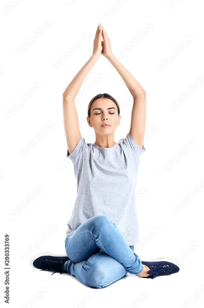 Beautiful woman practicing yoga on white background