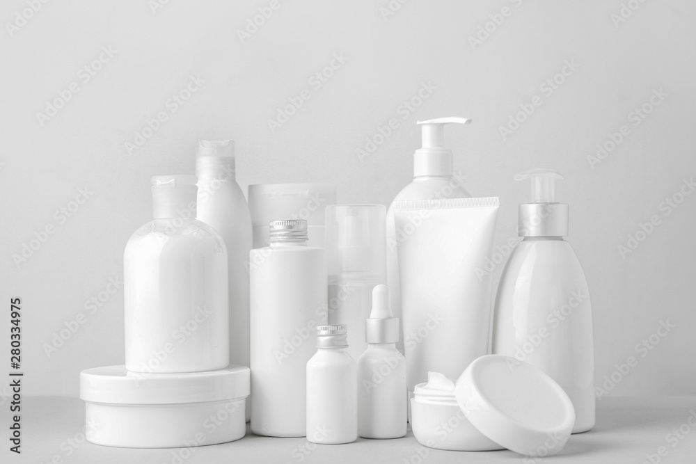 Set of cosmetic products on light background