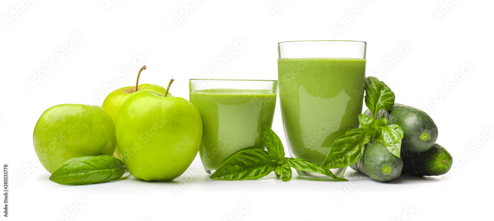 Glasses of healthy smoothie and ingredients on white background