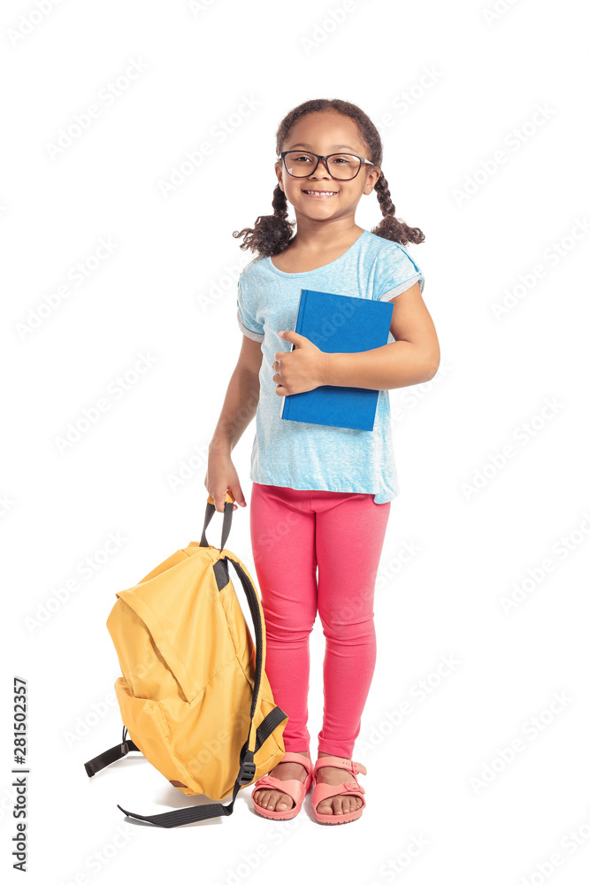 Adorable little African-American schoolgirl on white background