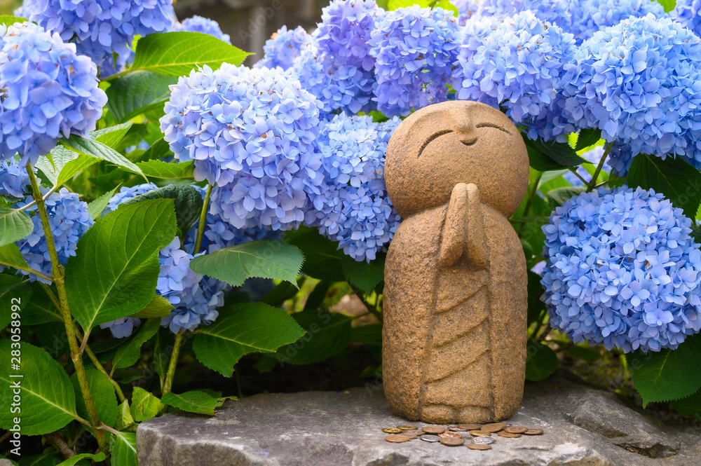 The stone craft of monk doll in Hydrangea garden in Japan