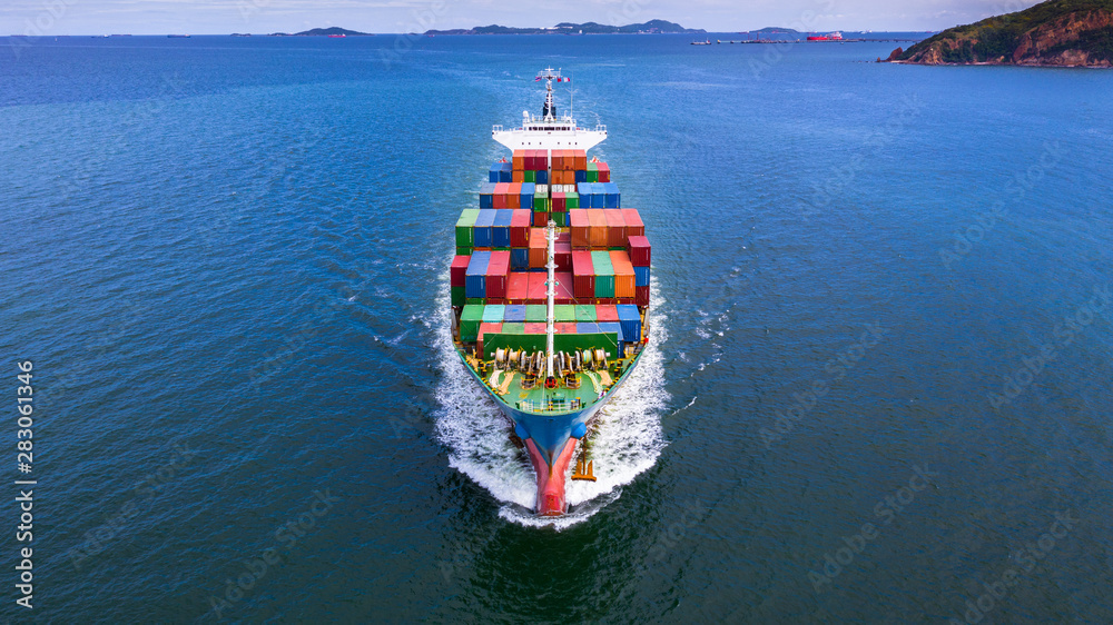 Aerial view container ship carrying container in import export business logistic and transportation 