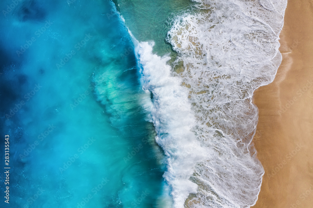 Coast as a background from top view. Turquoise water background from top view. Summer seascape from 