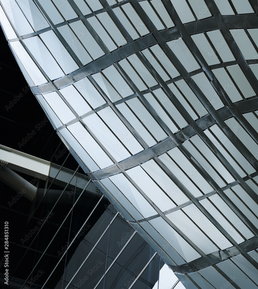 抽象现代建筑商务建筑抽象曲线细节钢立面背景。