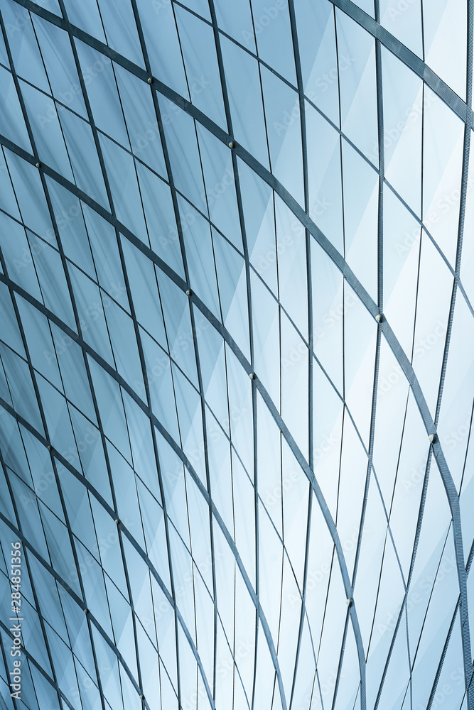 现代建筑商业建筑抽象曲线细节钢立面背景。