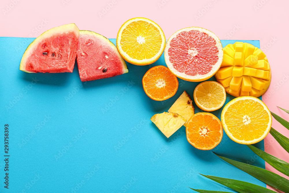 Composition with ripe fruits on color background