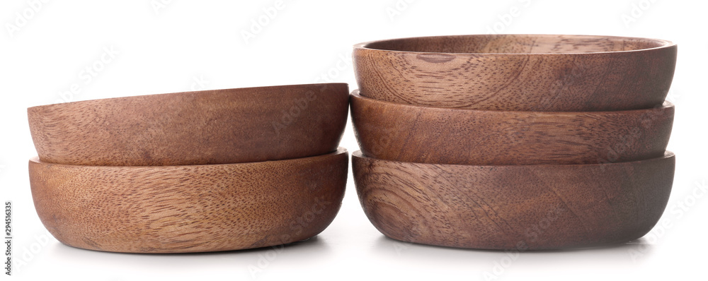 Wooden plates on white background