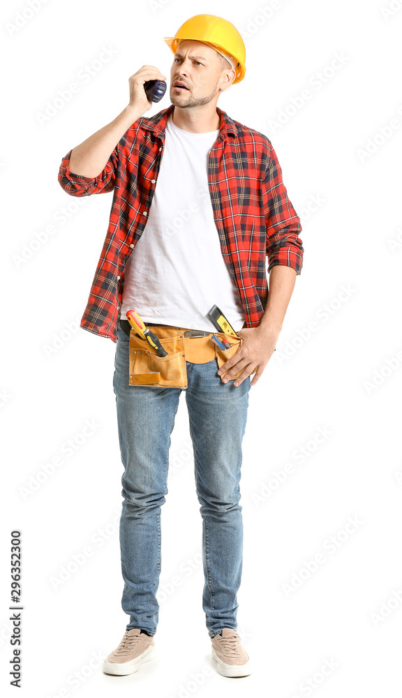 Portrait of male architect with portable radio transmitter on white background