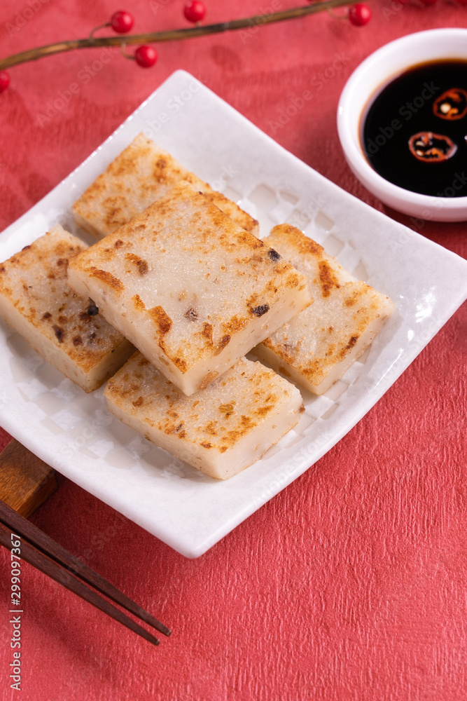 Chinese lunar new year food concept, Delicious turnip radish cake, local cuisine in restaurant with 