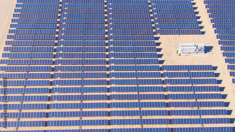 DRONE: Flying over a large solar panel farm deep in the Californian desert.