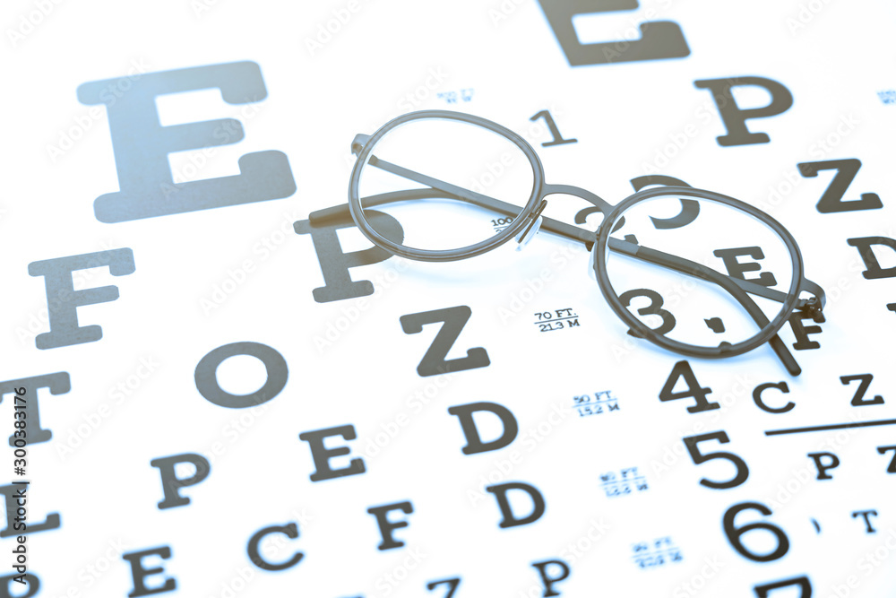 视力保护概念在视力表上的黑色眼镜