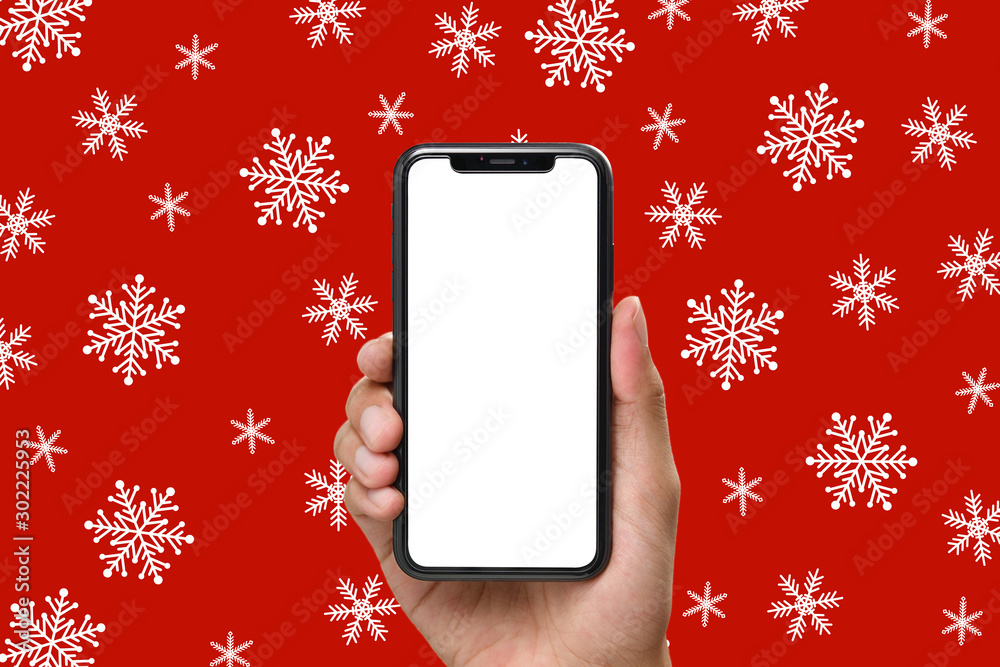 手持黑色智能手机，圣诞背面采用空白屏幕和现代无边框设计