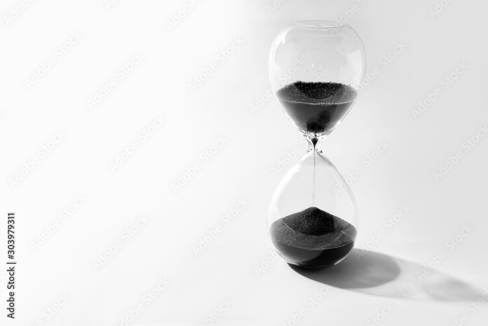 Crystal hourglass on light background