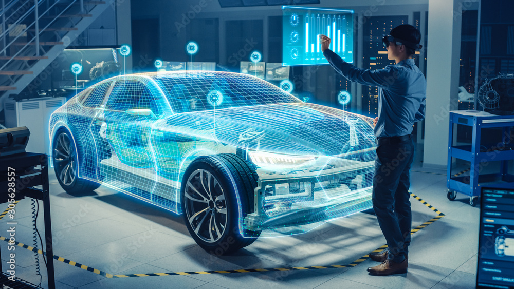 汽车工程师使用虚拟现实耳机进行虚拟电动汽车3D模型设计分析