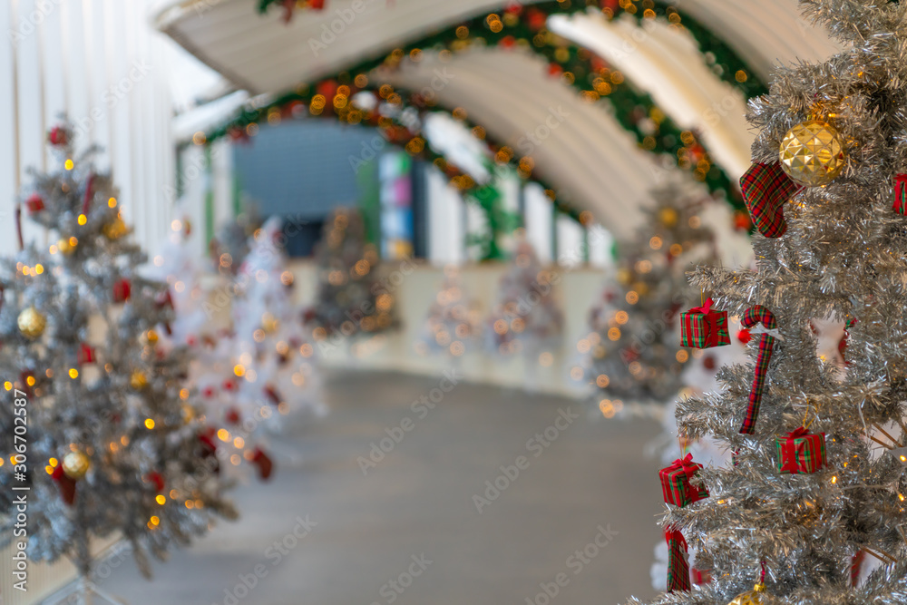 Christmas tree decoration along walkway in city center in Christmas festival of December 2019.
