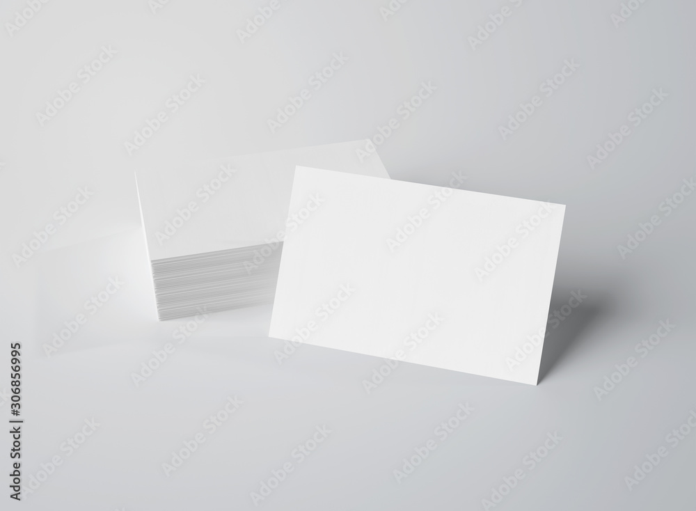 在白色3d渲染上隔离的一堆白色名片实物模型