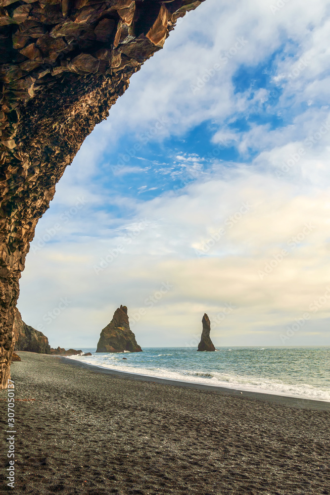 Black Sand Beach and basalt sea stacks in the city of Vik.Southern Iceland