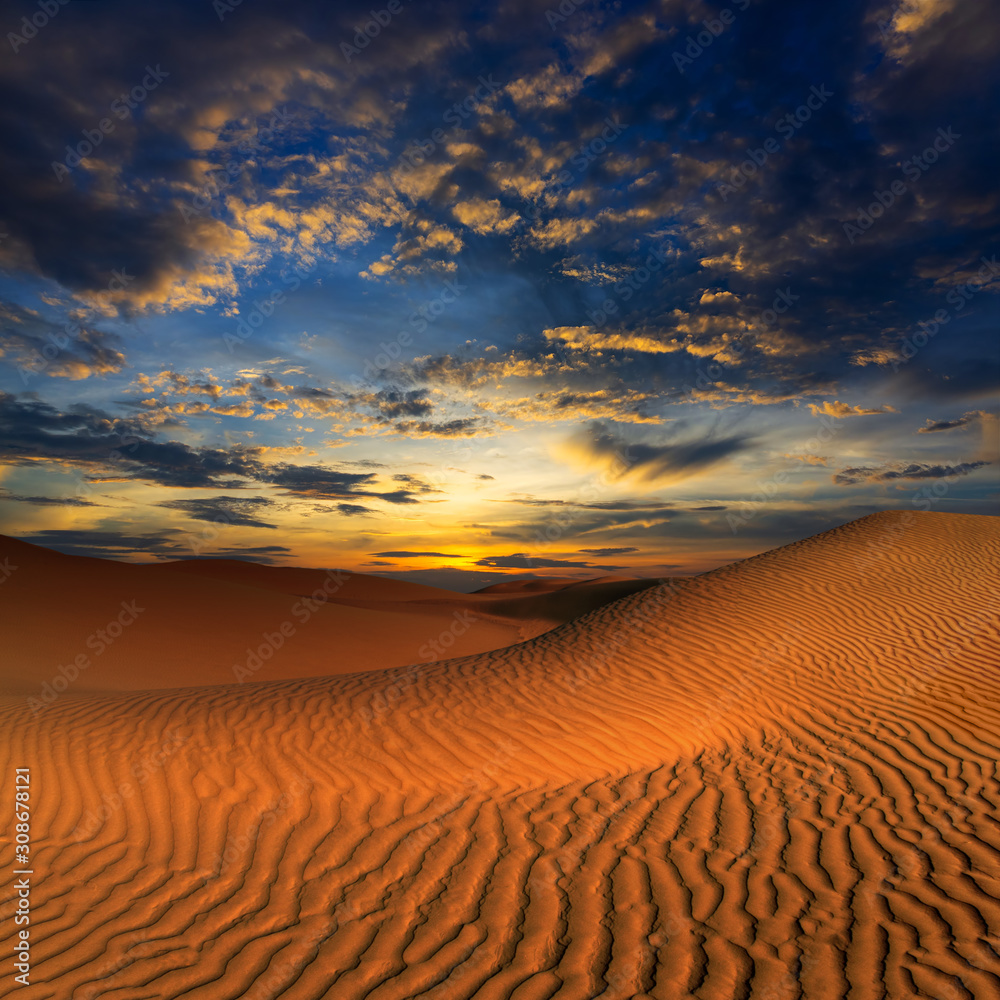 beatiful landscape with sand dunes in Sahara desert at sunset
