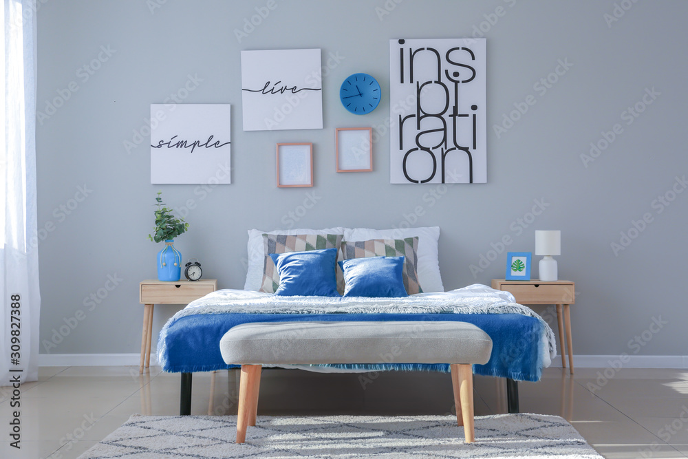 Stylish interior of bedroom in blue colors
