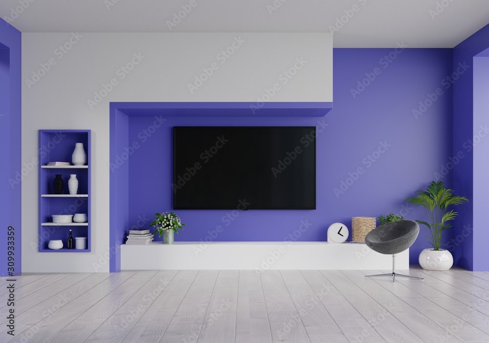 客厅蓝色幻影墙上的LED电视，简约设计。