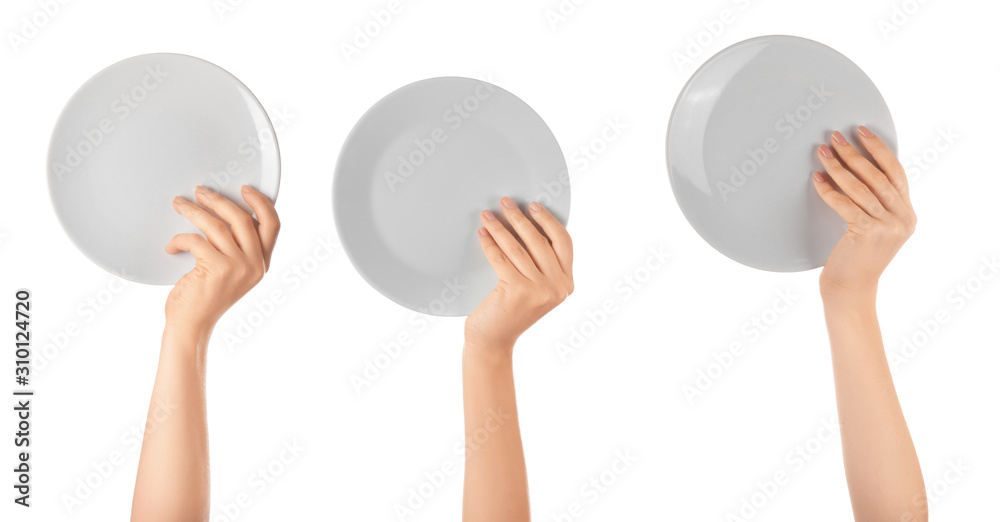 白色背景上有干净盘子的手