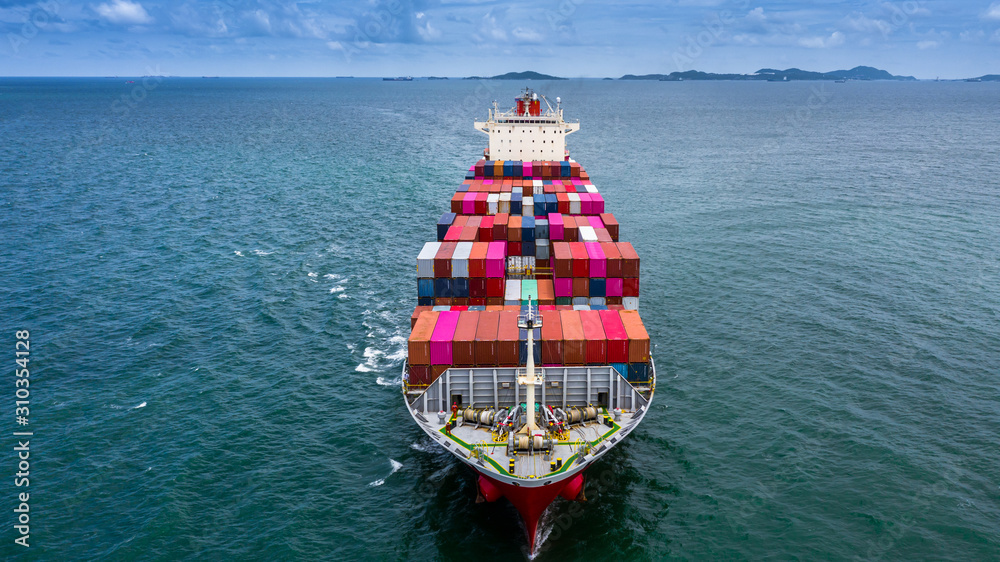 Container cargo ship carrying container for business logistic freight import and export, Aerial view