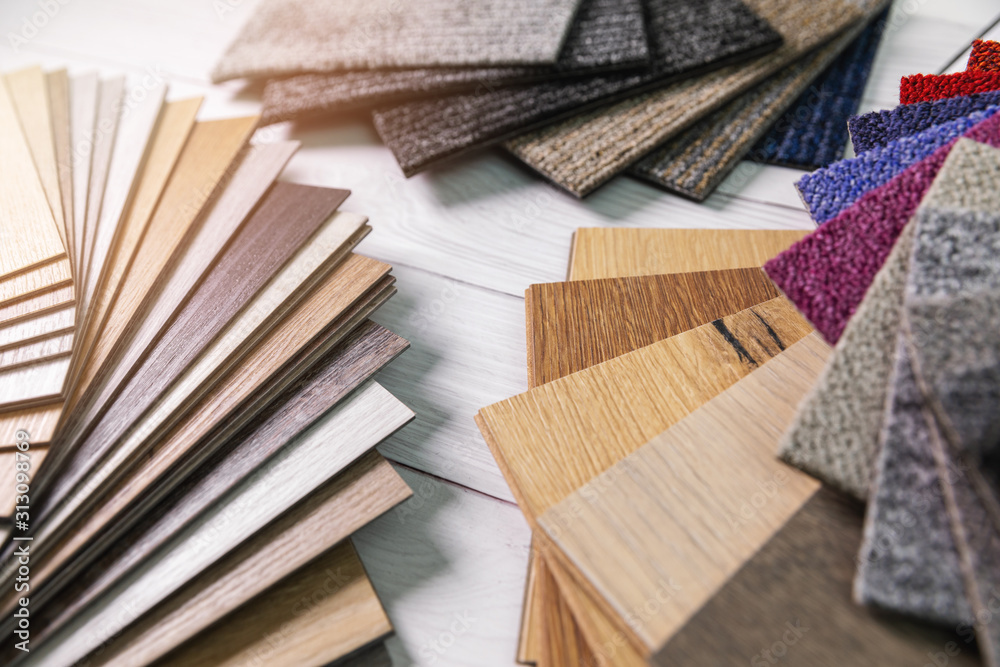 flooring and furniture materials - floor carpet and wooden laminate samples