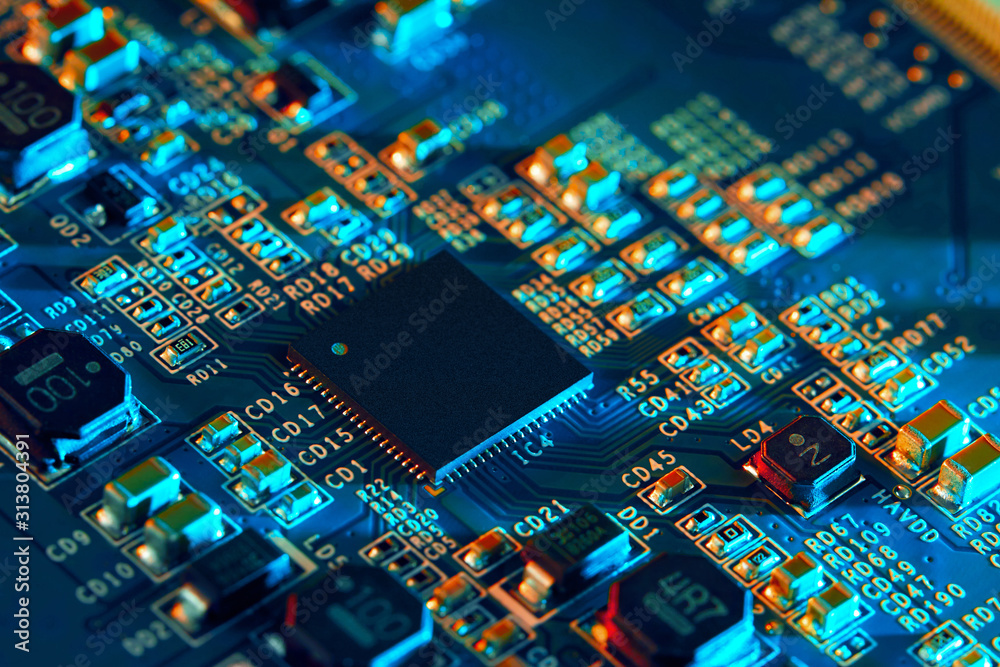 Electronic circuit board with electronic components such as chips close up. The concept of the elect
