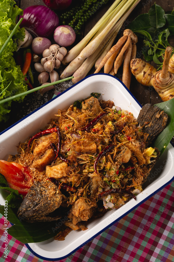 [Thai Esan food] Tubtim fish salad, herbs for health, Thai Esan local food, Thailand