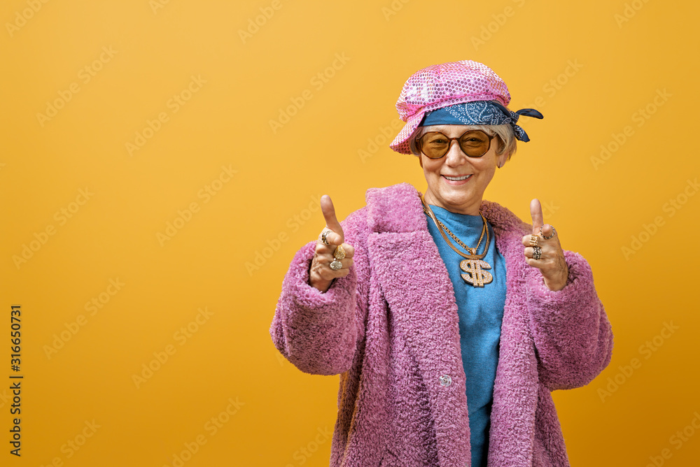 senior woman on color background.
