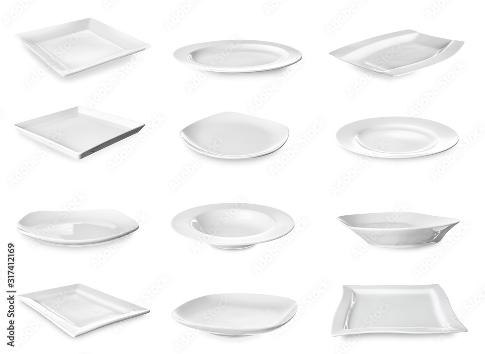 Different ceramic plates on white background