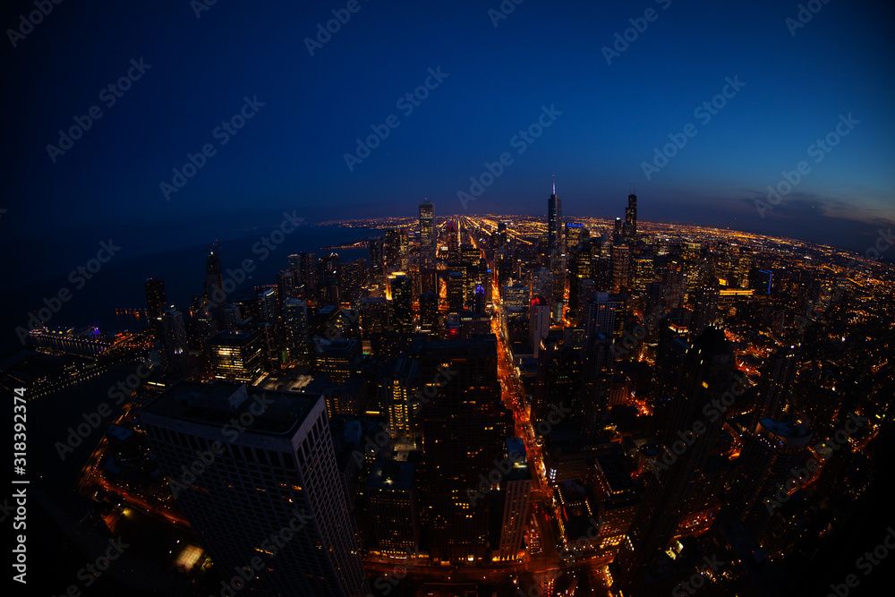 Bird eyes view panorama of Chicago city downtown at night skyscrapers and streets, Illinois USA