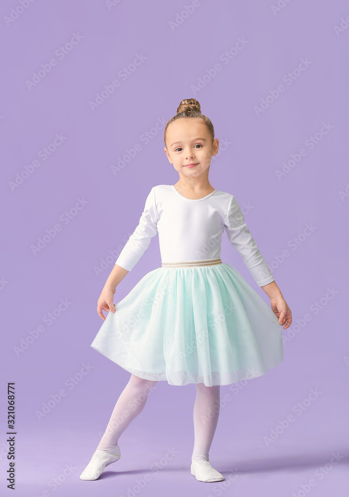 Cute little ballerina on color background