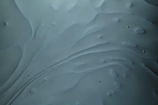 美丽的抽象背景灰色纹理曲线。水中的油滴。