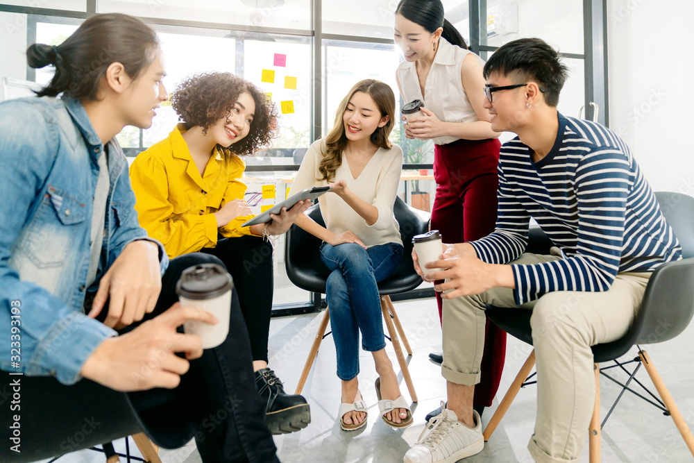 Group of asian young creative happy people entrepreneur on a business meeting office background Good