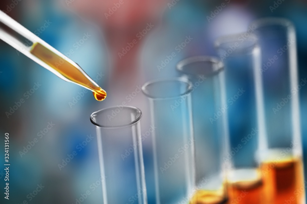 Yellow oil test analysis with test tubes
