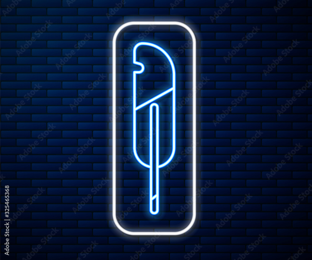 Glowing neon line Feather pen icon isolated on brick wall background.  Vector Illustration