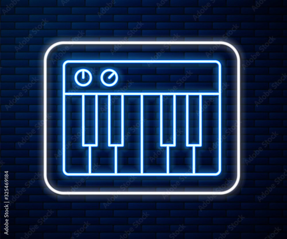 闪闪发光的霓虹线音乐合成器图标隔离在砖墙背景上。电子钢琴。Vecto
