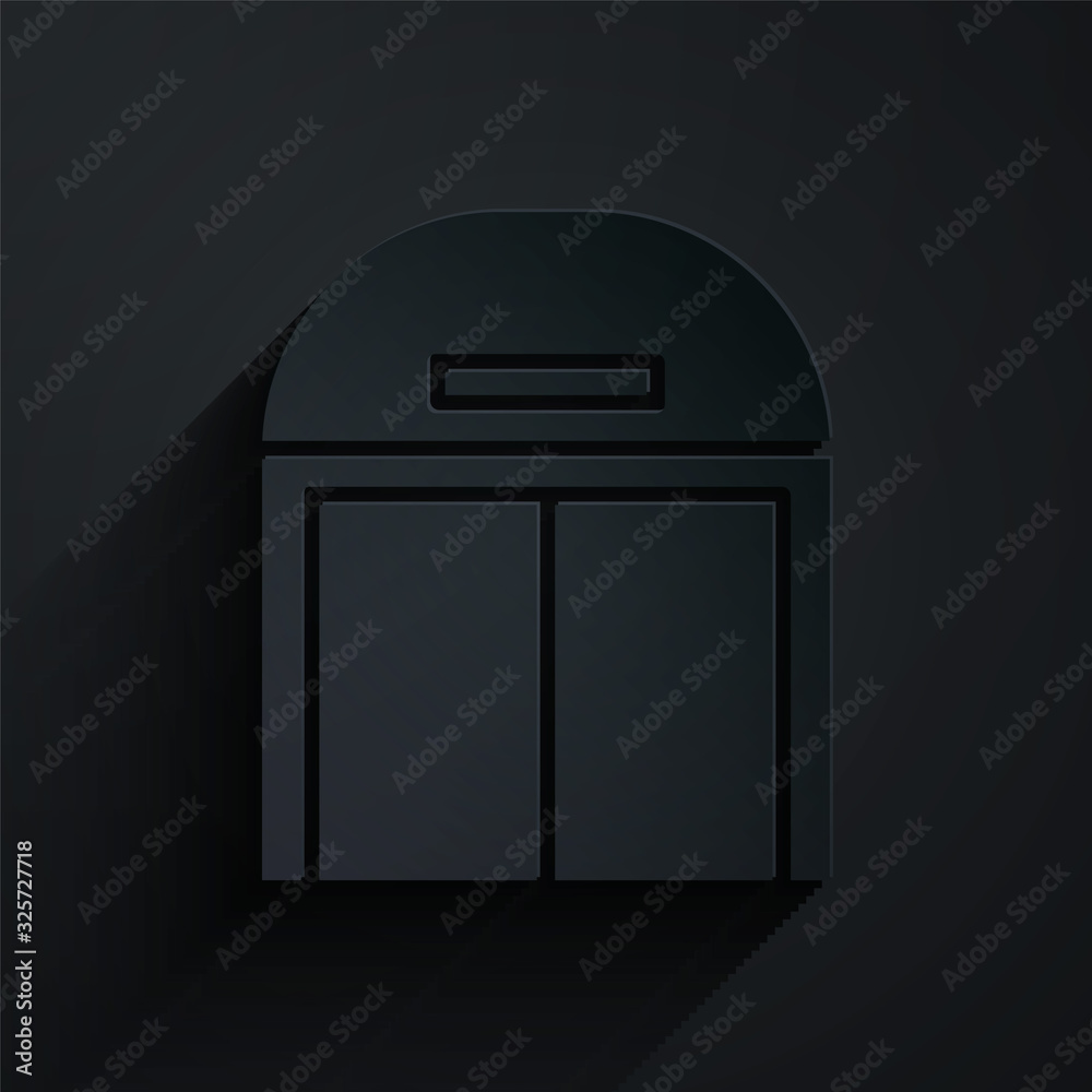 Paper cut Aircraft hangar icon isolated on black background. Paper art style. Vector Illustration