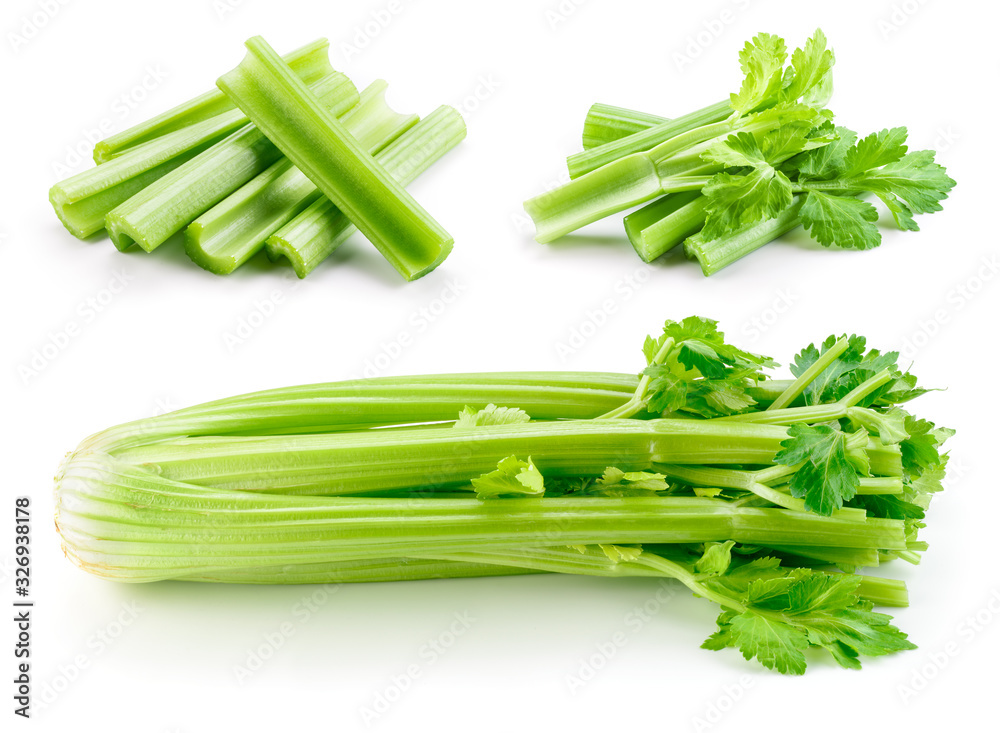 分离的芹菜茎。芹菜粘在白色上。带叶子的绿色芹菜。放在白色背景上。