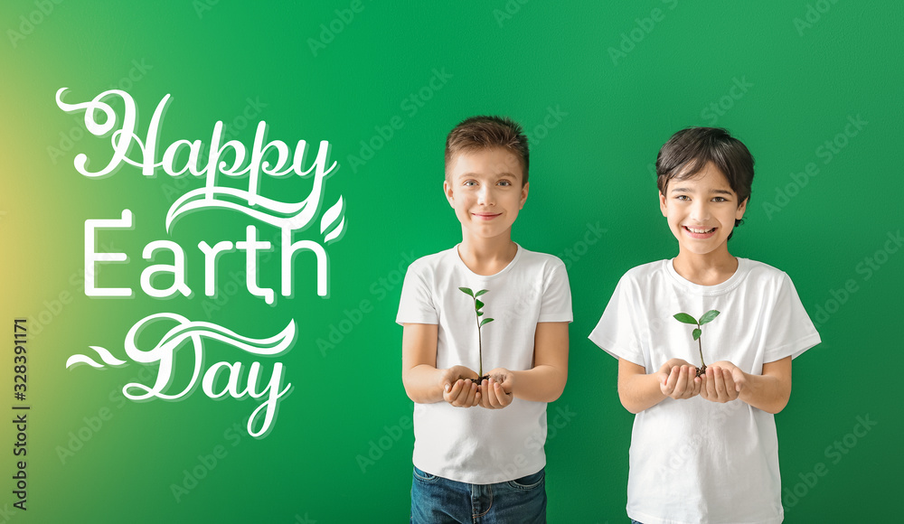 Little children with plants and text HAPPY EARTH DAY on color background