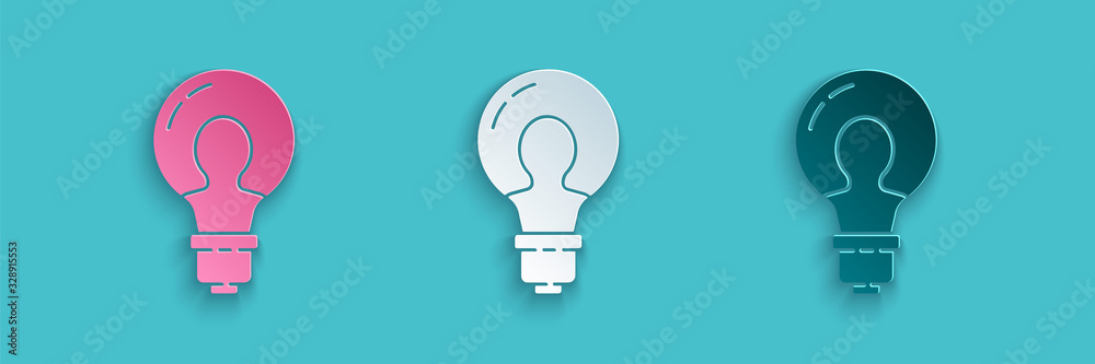 蓝色背景上有创意图标概念的剪纸灯泡。能量和创意符号。