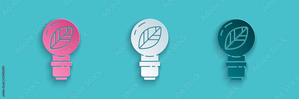 Paper cut Light bulb with leaf icon isolated on blue background. Eco energy concept. Alternative ene