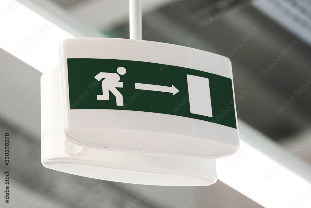 Fire exit sign in building